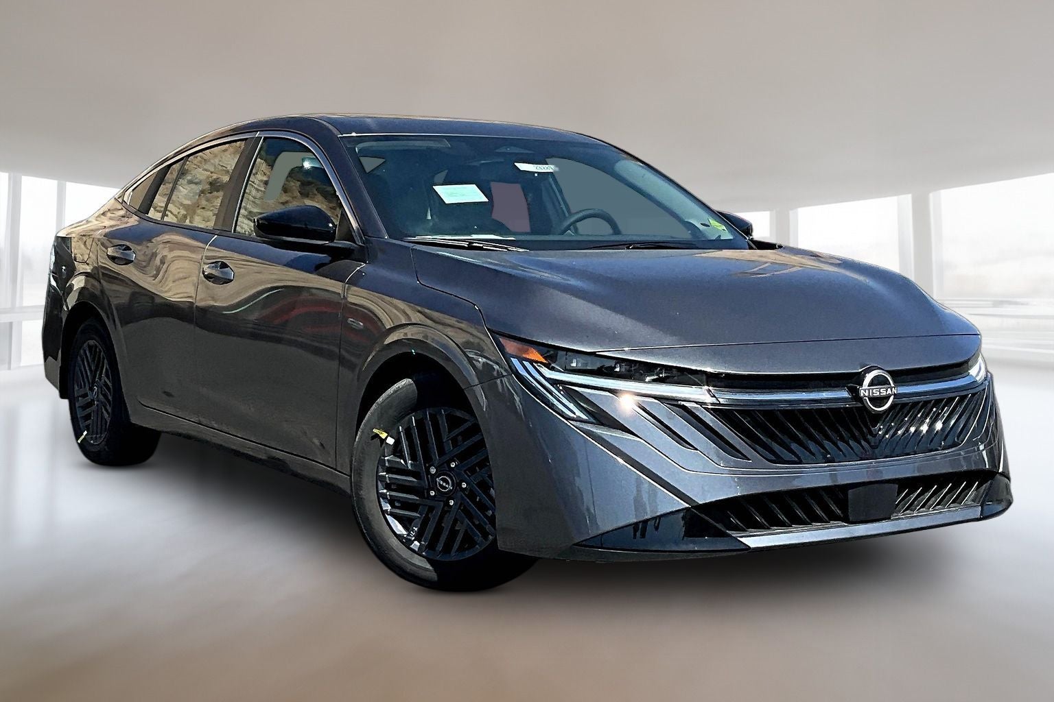 2026 Nissan Sentra SV in Gun Metallic — front three-quarter view