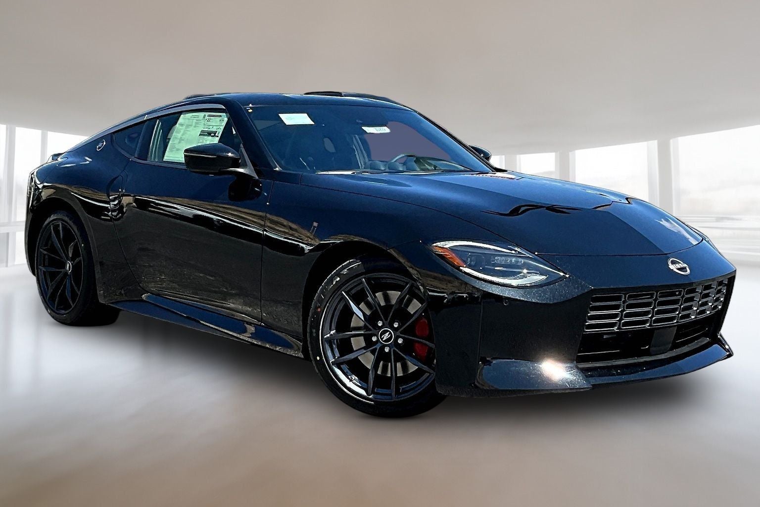 2026 Nissan Z Performance in Black Diamond Pearl — front three-quarter view